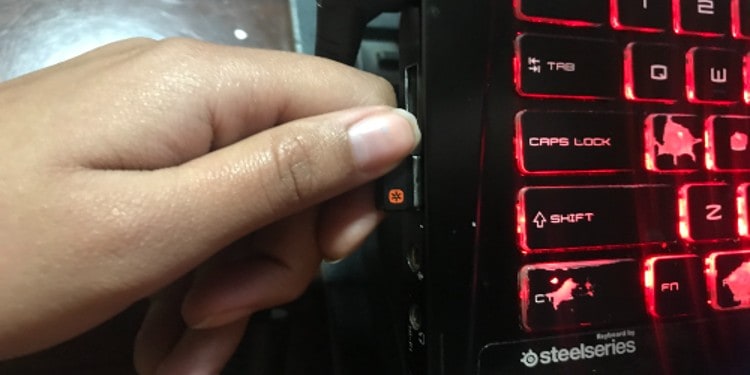 Plug the USB dongle