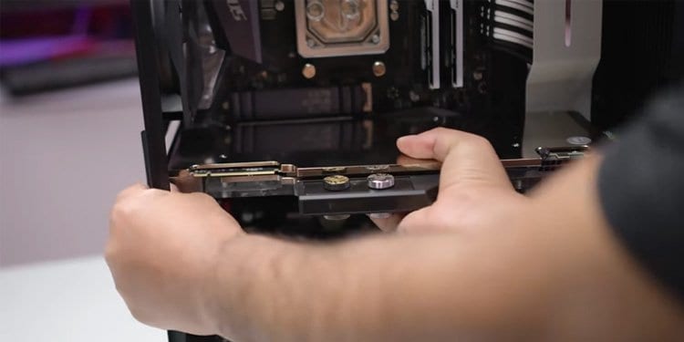 How To Fix VGA Lights on Motherboard 3 Reinserting Graphics Card