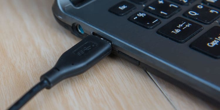 insert usb cable back