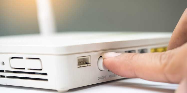 Why is My XFINITY Router Blinking Orange? How to Fix It 3 turn-off-router
