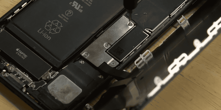 Detach the battery connector bracket