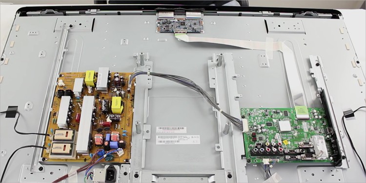 looking-at-tv-components-before-flashlight-test