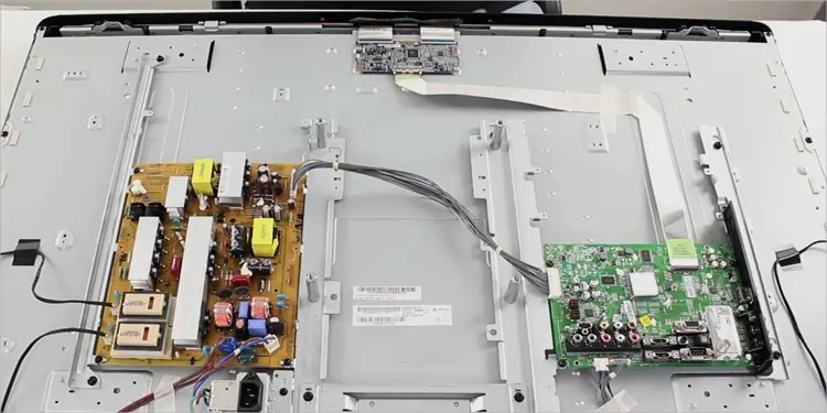looking-at-tv-components-before-flashlight-test