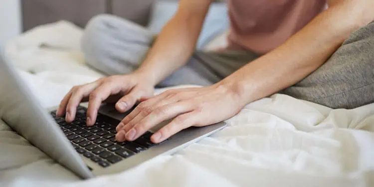How to Safely Use Laptop on Bed Without Overheating It