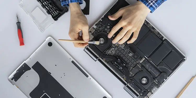 brush off dust from laptop fan
