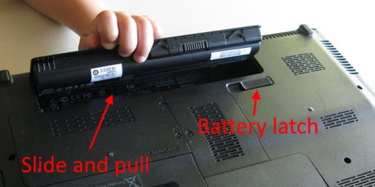 Spilled Water on Laptop? Here’s What You Can Do 2 removing laptop battery