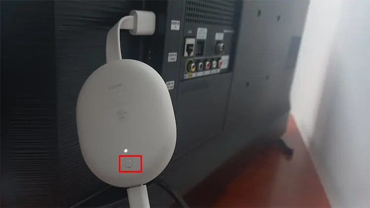 Locate-a-small-circular-button-on-Chromecast-1