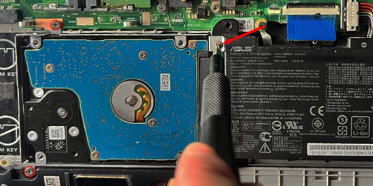 Remove-screws-holding-the-hard-drive