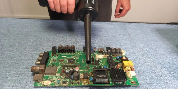 clean-main-board-using-blower