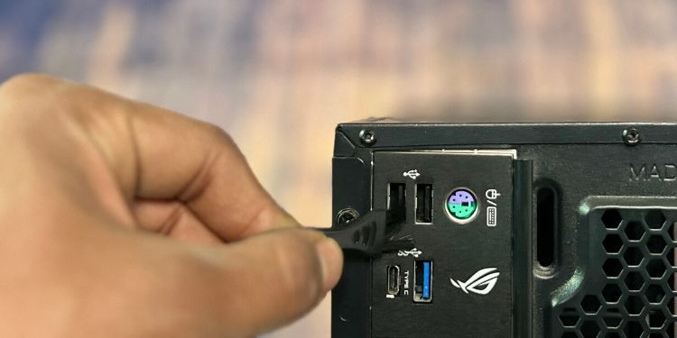 clean usb port using a brush