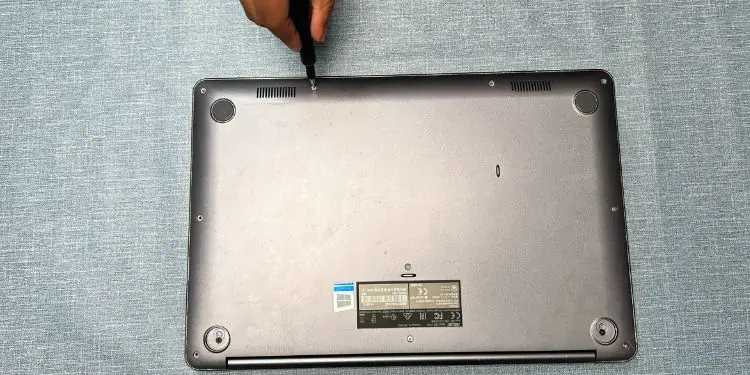 Display Not Working on Laptop? 9 Ways to Fix It 18 open-bottom-casing-laptop