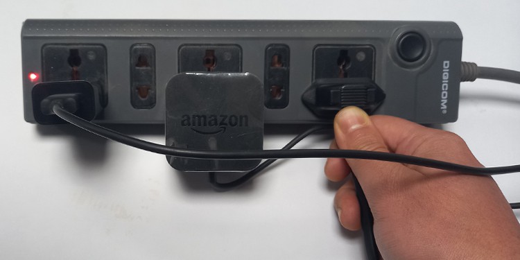remove-power-cord-of-tv-from-power-supply