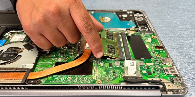 remove ram stick from laptop
