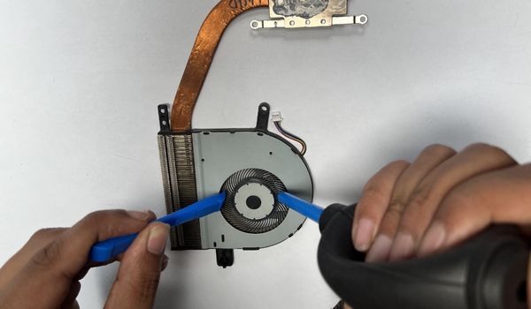 clean laptop fan using compressed air