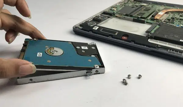 How to Replace Laptop Hard Drive (Step-by-Step Guide) 17 new-hdd-into-the-caddy