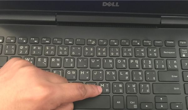 press and hold m key in dell