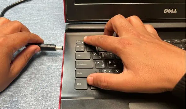 press-ctrl-esc-keys-and-plug-in-the-ac-adapter