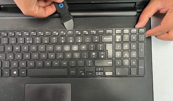 pry off keyboard panel