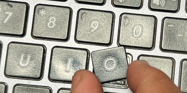 reattch key in laptop keyboard