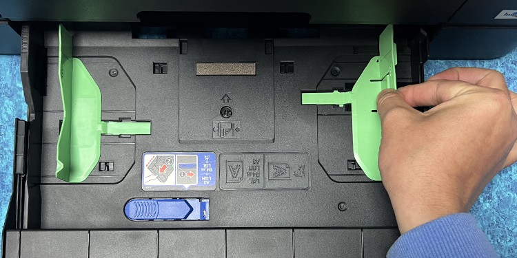 slide-the-paper-guides-in-front-tray