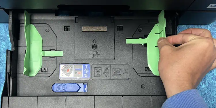 slide-the-paper-guides-in-front-tray