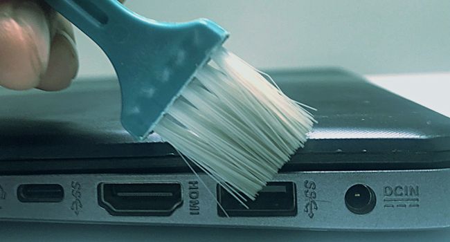 brush laptop port