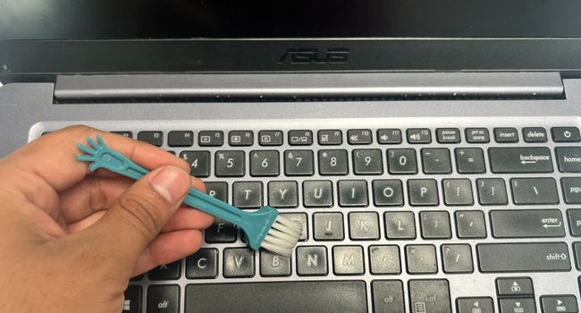 brush to clean laptop keypad