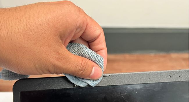 clean laptop bezel surface