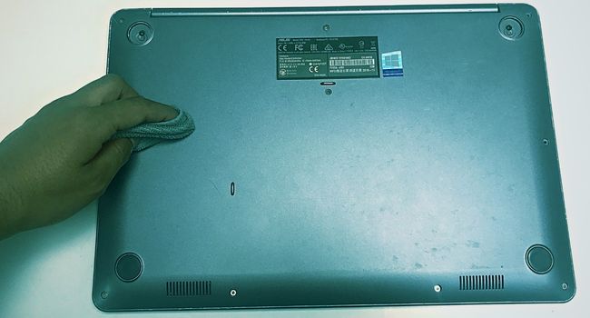 clean laptop bottom casing frontal section
