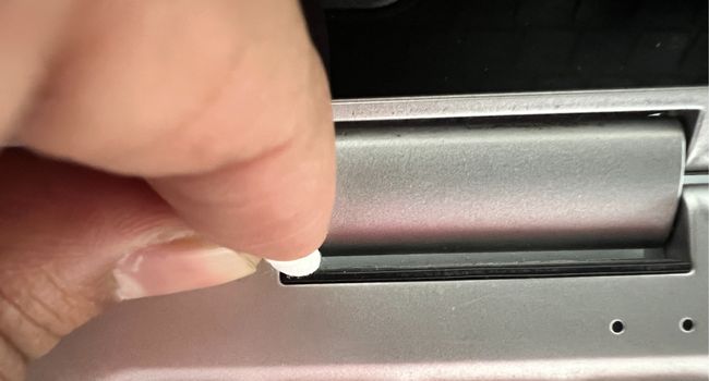 clean laptop hinge using qtip