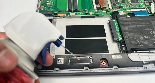 How to Clean a Laptop: Comprehensive Guide 41 clean-laptop-speaker-with-compressed-air