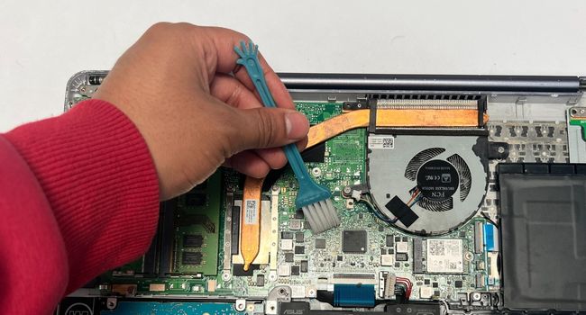 clean motherboard using brush