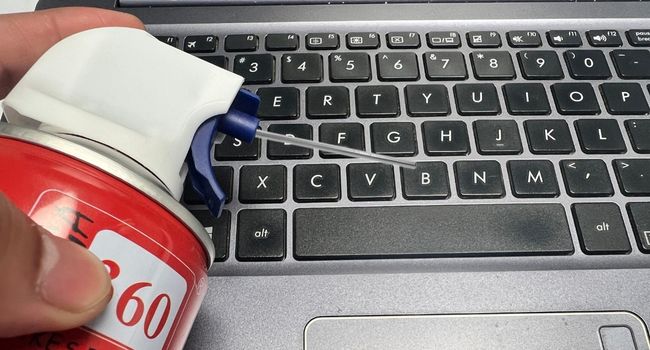 compressed air cleaning laptop keyboard
