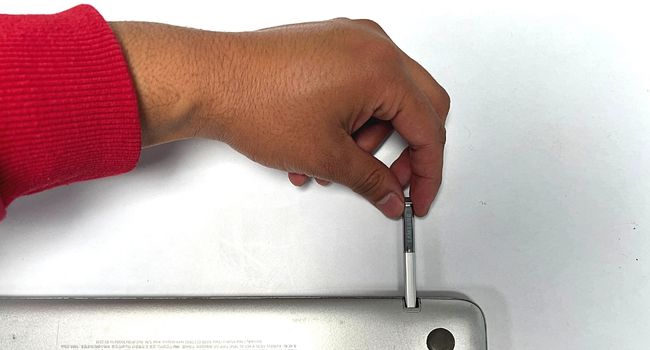 pull out pen from laptop
