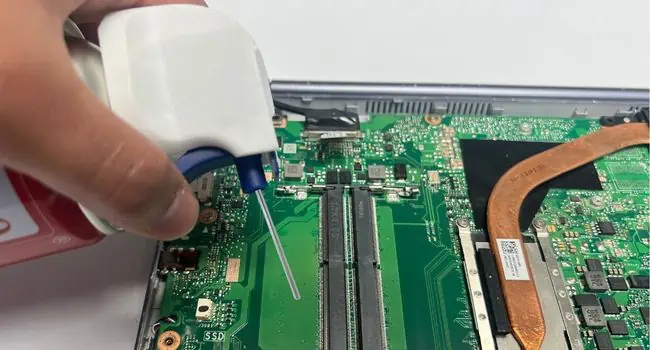 How to Increase RAM on Laptop? (Step-by-Step Guide) 17 ram-slots-cleaning-compressed-air
