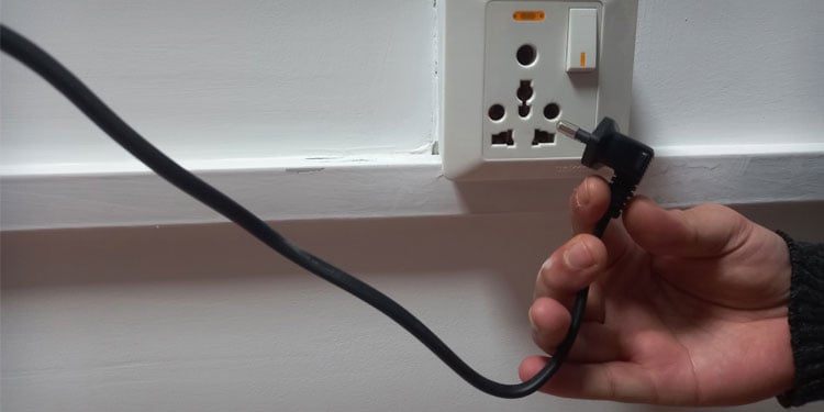 remove pc from wall outlet