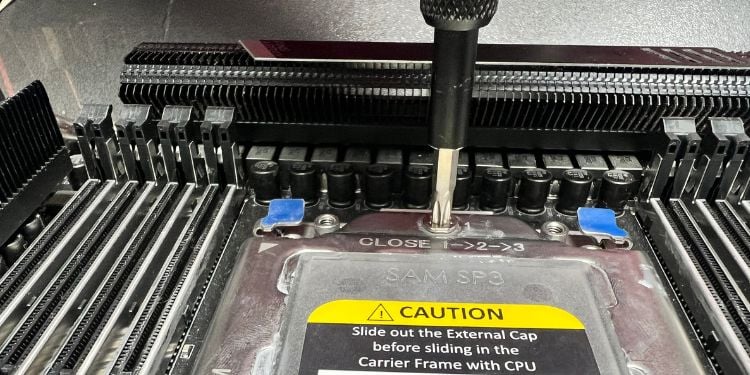 untighten screws to slide out external cap