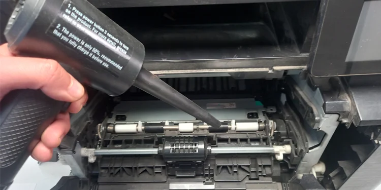 blow-dust-and-debris-out-of-printer