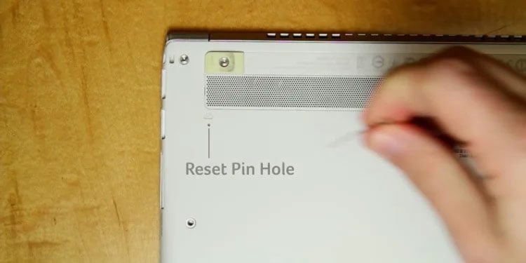 battery reset pinhole lenovo laptop