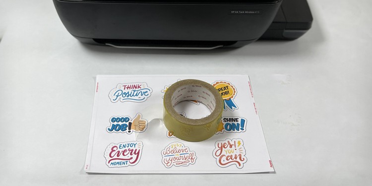 put-transparent-tape-in-sticker-paper
