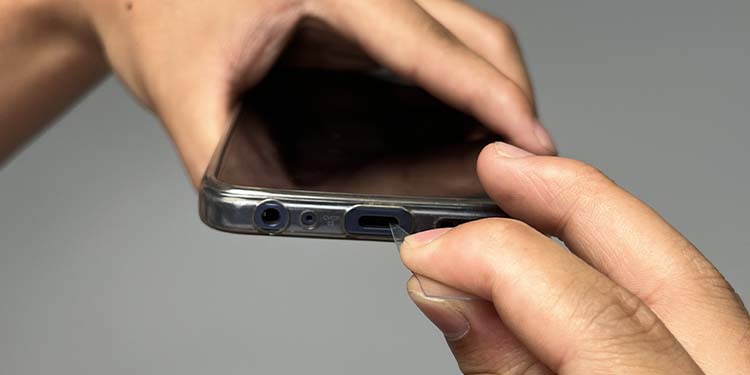 scraping out lint from charging port