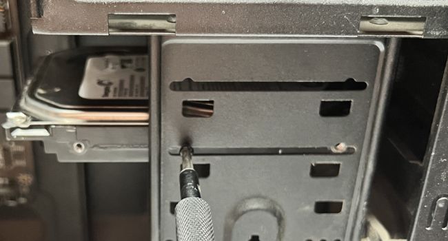 screwdrive the hdd holes