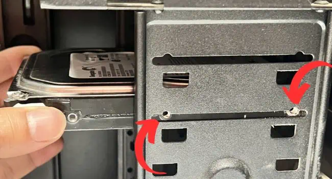 How to Install a Hard Drive? (Step-By-Step Guide) 18 sliding-hdd-aligning-the-holes