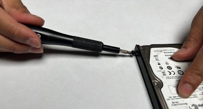 unscrew hdd bracket