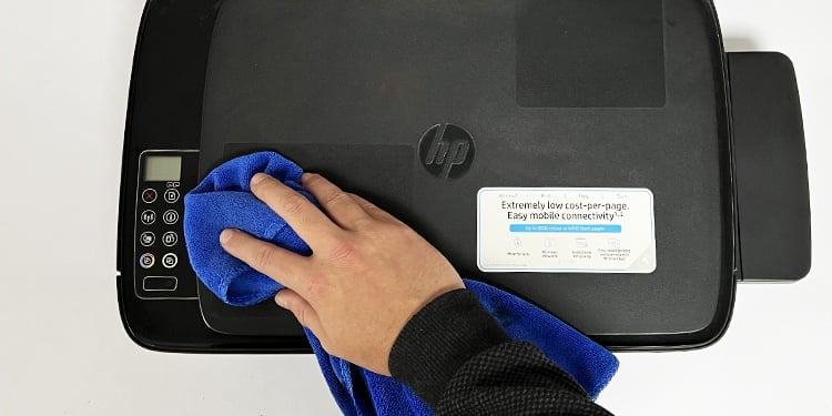 wipe-exterior-of-printer-with-cloth