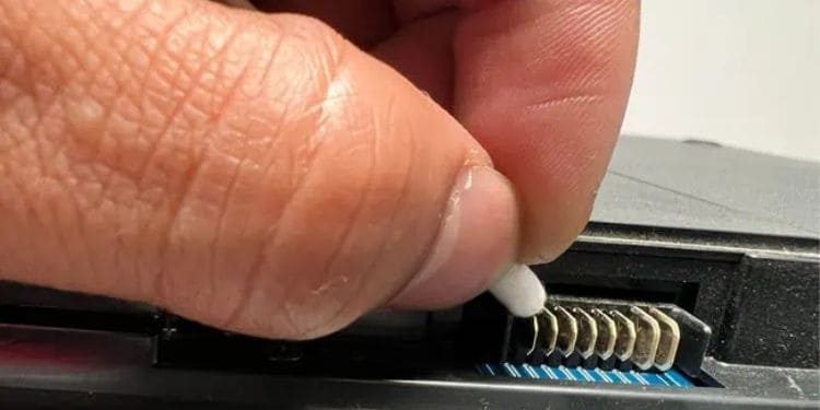cleaning laptop battery pins