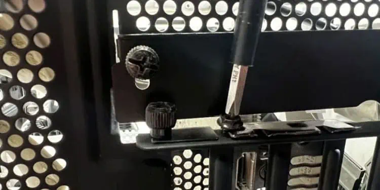 8 Ways to Fix Monitor Blinking On and Off 15 remove-retention-bracket-graphics-card-monitor-blinking