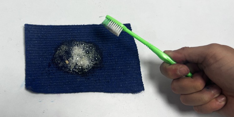scrub-the-carpet-with-toothbrush