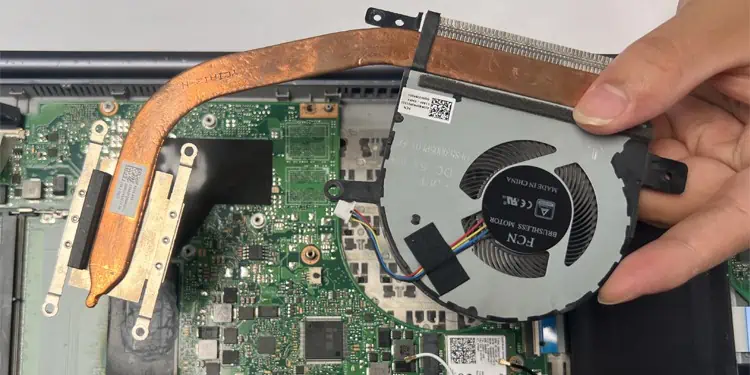 How to Clean a Laptop Fan (Step-by-Step Guide) 11 take-out-laptop-fan-and-heat-sink