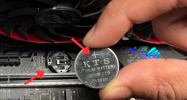 cmos battery polarity